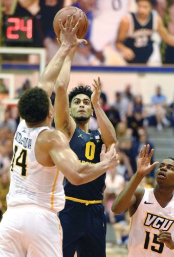 Rowsey, Howard help Marquette down VCU